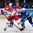 OSTRAVA, CZECH REPUBLIC - MAY 11: Denmark's Kirill Starkov #14 battles for the puck with Slovenia's Bostjan Golicic #71 during preliminary round action at the 2015 IIHF Ice Hockey World Championship. (Photo by Richard Wolowicz/HHOF-IIHF Images)

